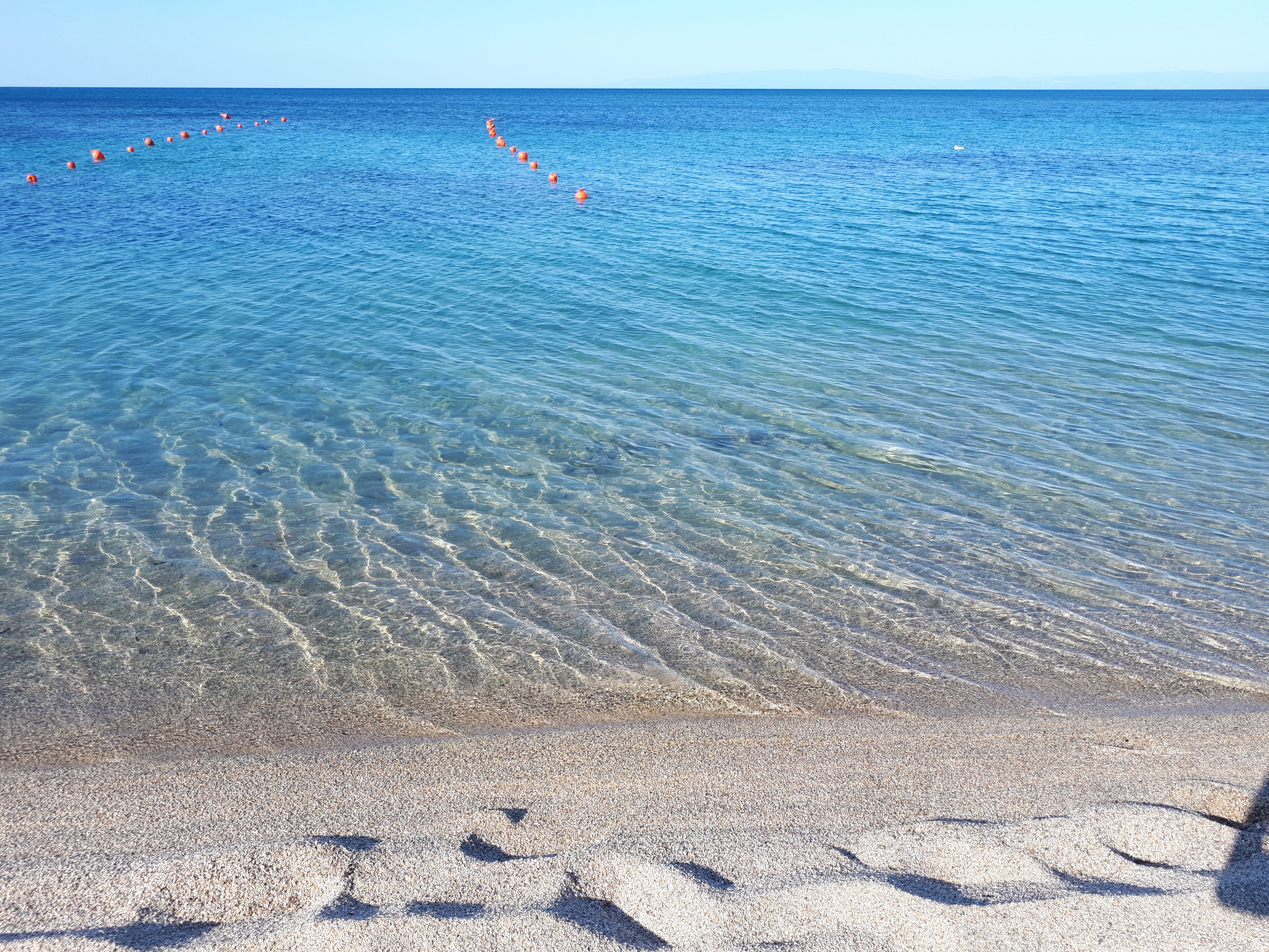 Sabbia finissima e acque cristalline a Praialonga, Isola di Capo Rizzuto